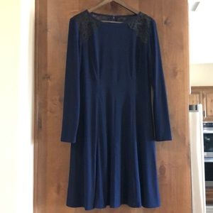 Blue cocktail dress with black lace detail